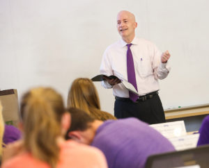 Chancellor Boschini teaching an undergraduate leadership course